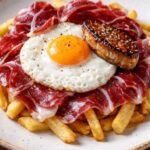 Huevo jamón ibérico foie y patatas